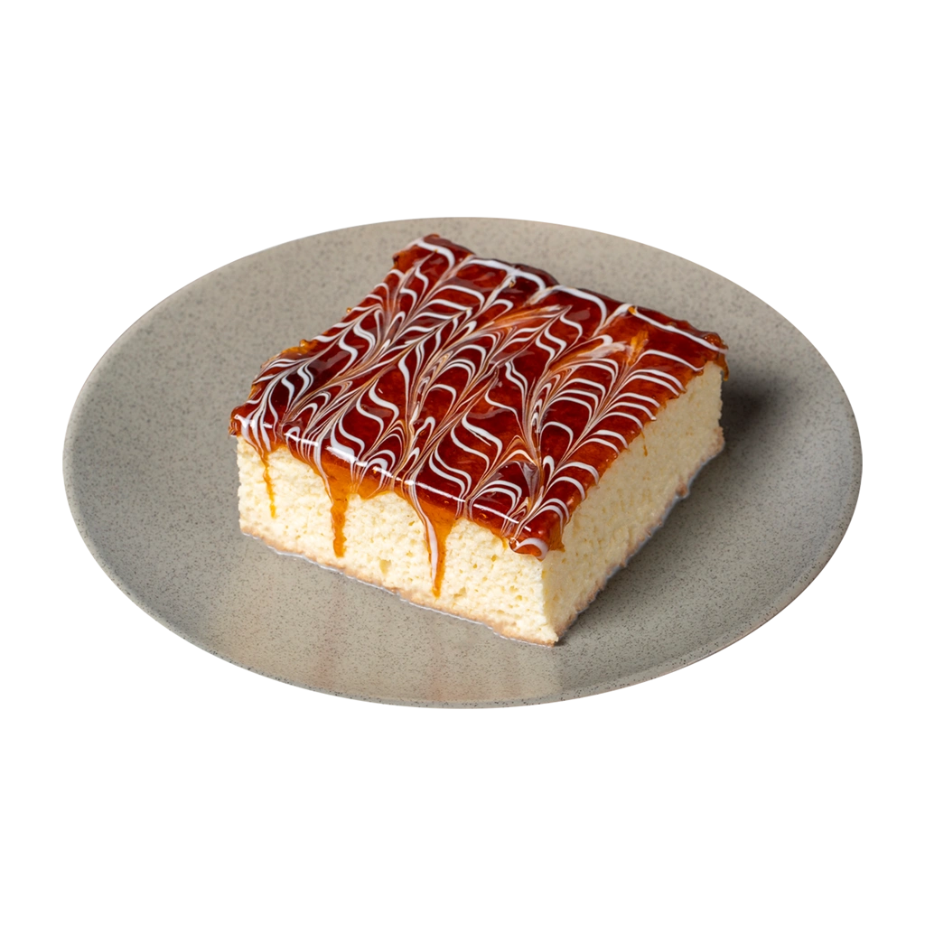 Trilece cake from Yumme Desserts UK, a soft sponge soaked in milk and topped with caramel.