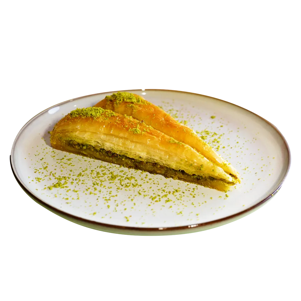 yumme-desserts-baklava-watford Traditional Turkish baklava made with layers of filo pastry, pistachios and syrup at Yumme Desserts in Watford.